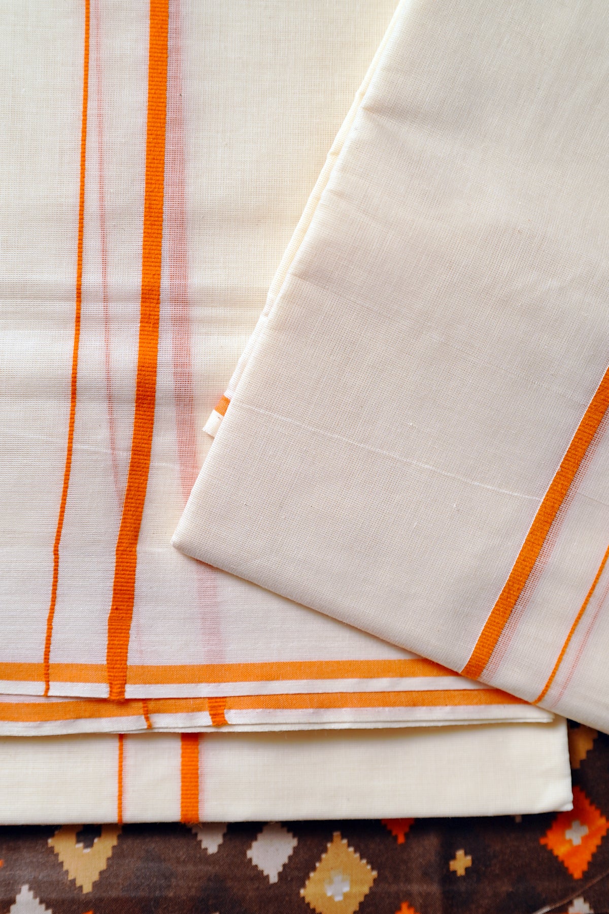 Pavithra -Orange puliyilakkara with Blouse Material
