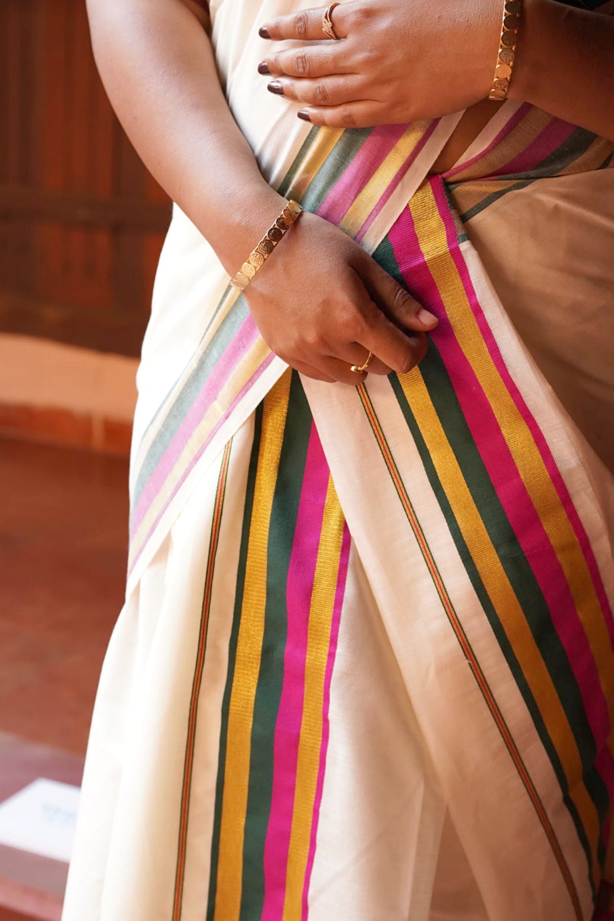 Sindhu – Magenta and Green Kasav Settumund with Matching Blouse Material