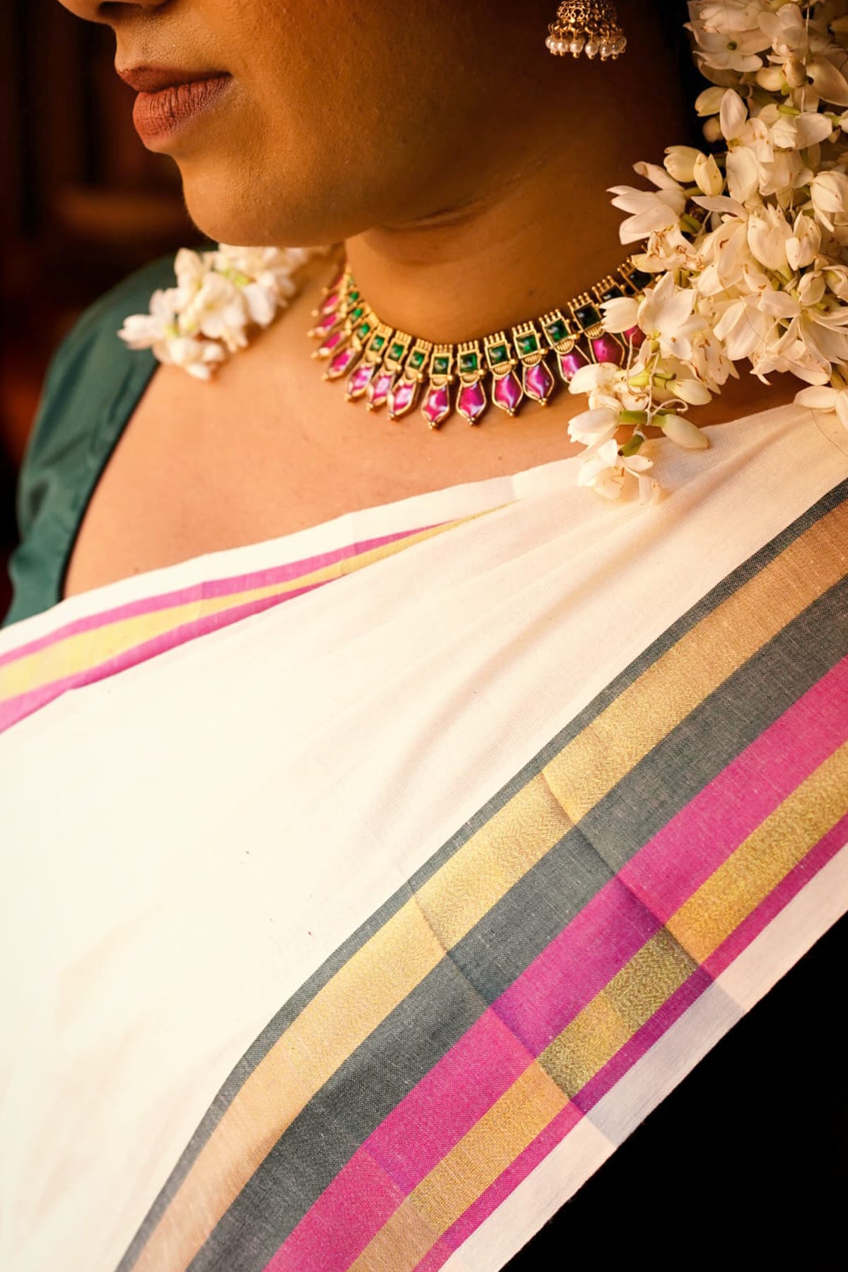 Sindhu – Magenta and Green Kasav Settumund with Matching Blouse Material