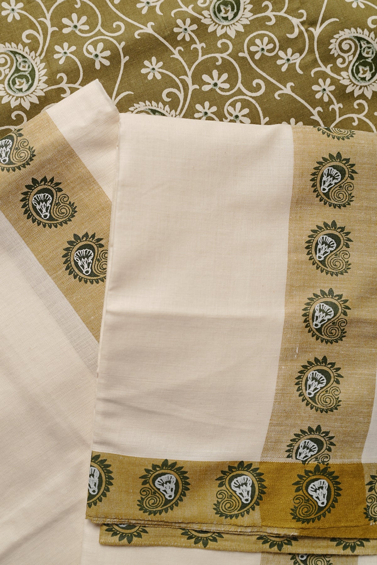 Thumba White Thumba Printed on Green Kattikkara Settumund with Matching Blouse Material