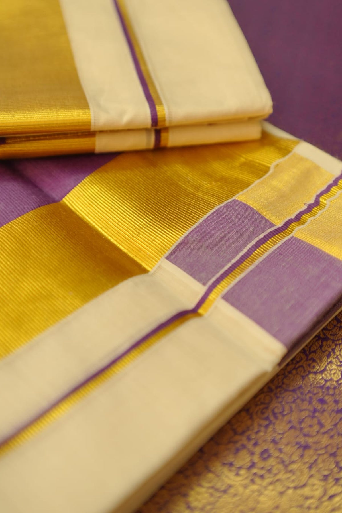 Aathira – Violet and Golden Kasav Settumund with Brocade Blouse Material