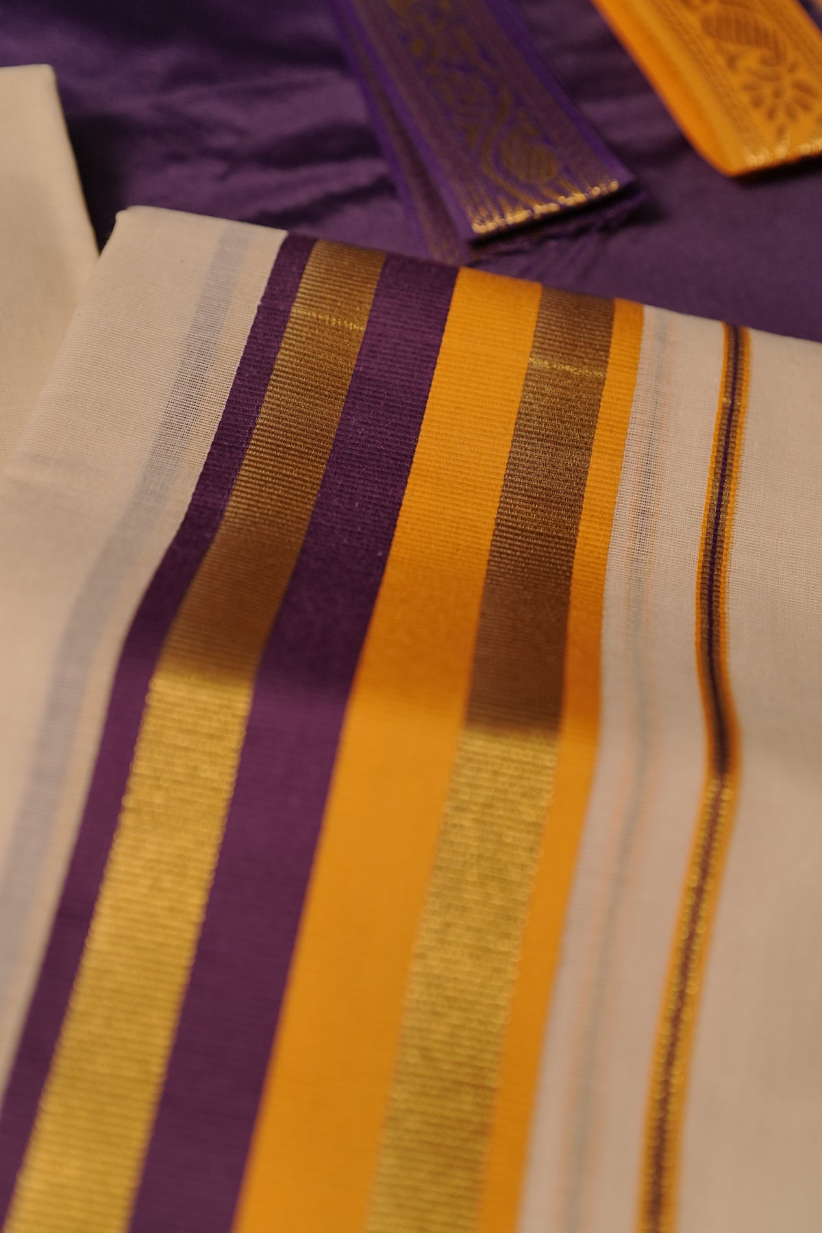 Yamuna – Violet and Yellow Kasav Settumund with Matching Blouse Material