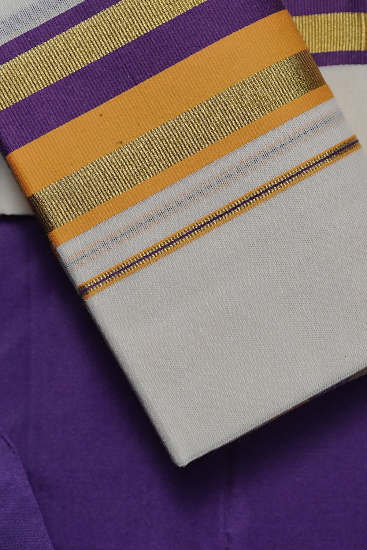 Yamuna – Violet and Yellow Kasav Settumund with Matching Blouse Material