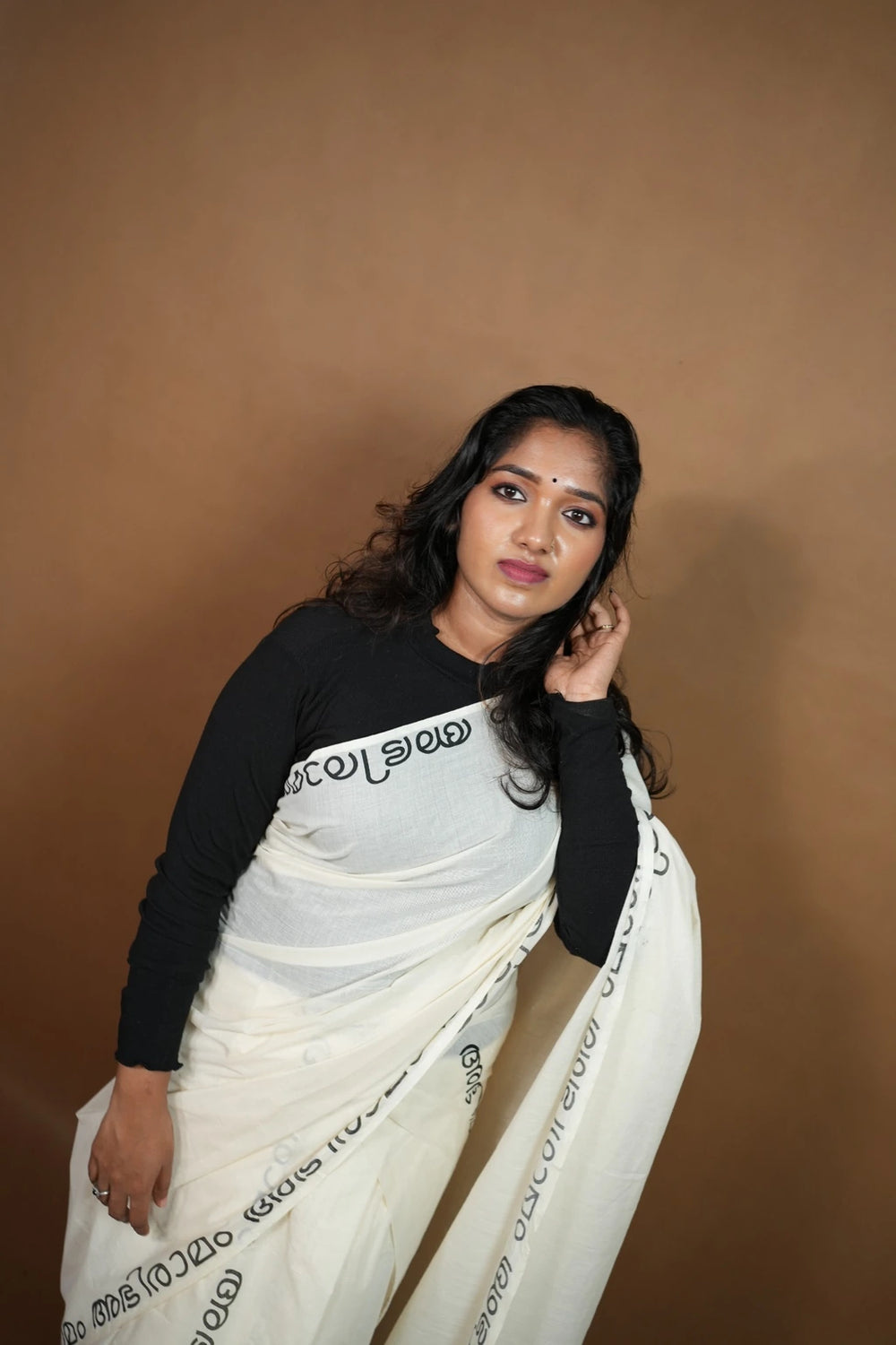 Second model pose wearing Abhiramam Printed Settumund