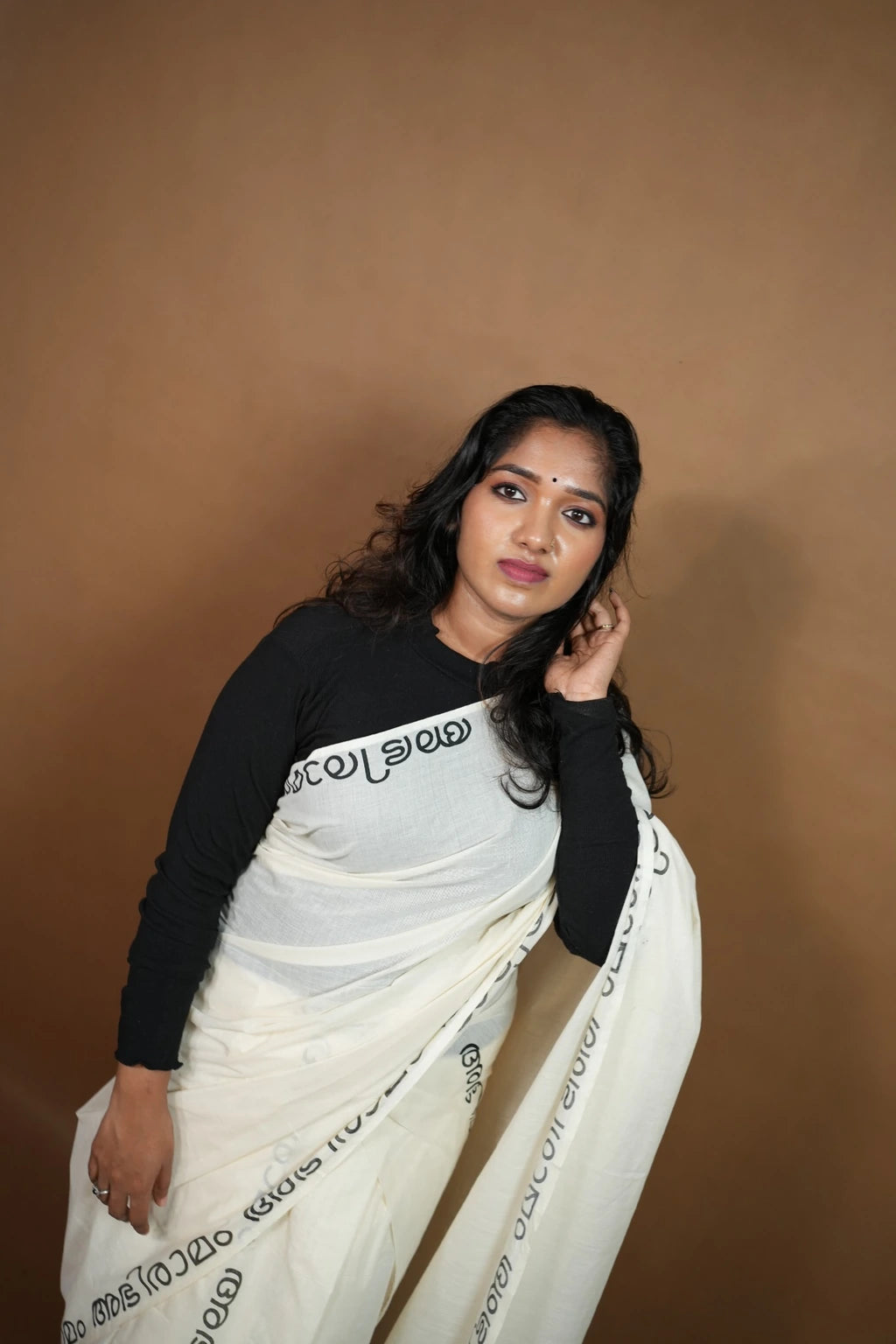 Second model pose wearing Abhiramam Printed Settumund