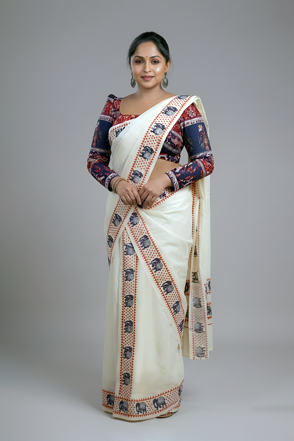 Aanachantham- Orange and Navy Blue Elephant Printed Settumund with Matching Blouse Material