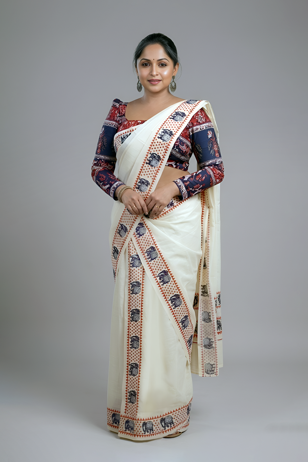 Aanachantham- Orange and Navy Blue Elephant Printed Settumund with Matching Blouse Material