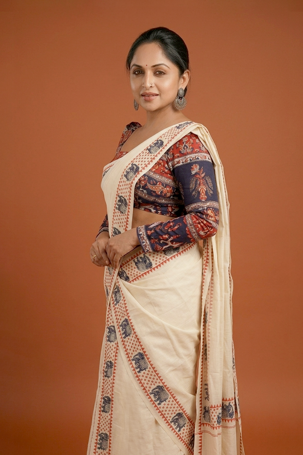 Aanachantham- Orange and Navy Blue Elephant Printed Settumund with Matching Blouse Material