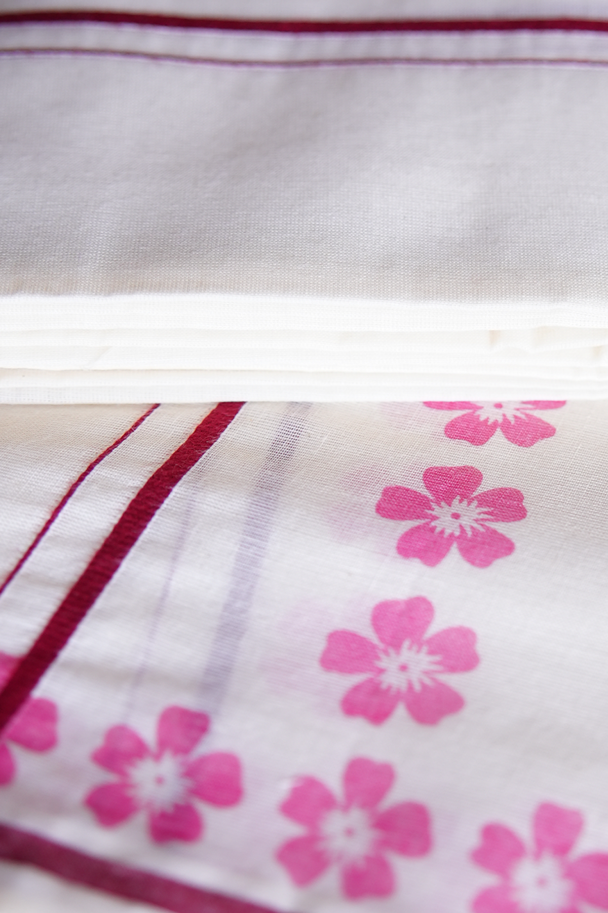 Arunima - Pink Floral Printed Puliyilakkara Settumund with Matching Floral Blouse Material