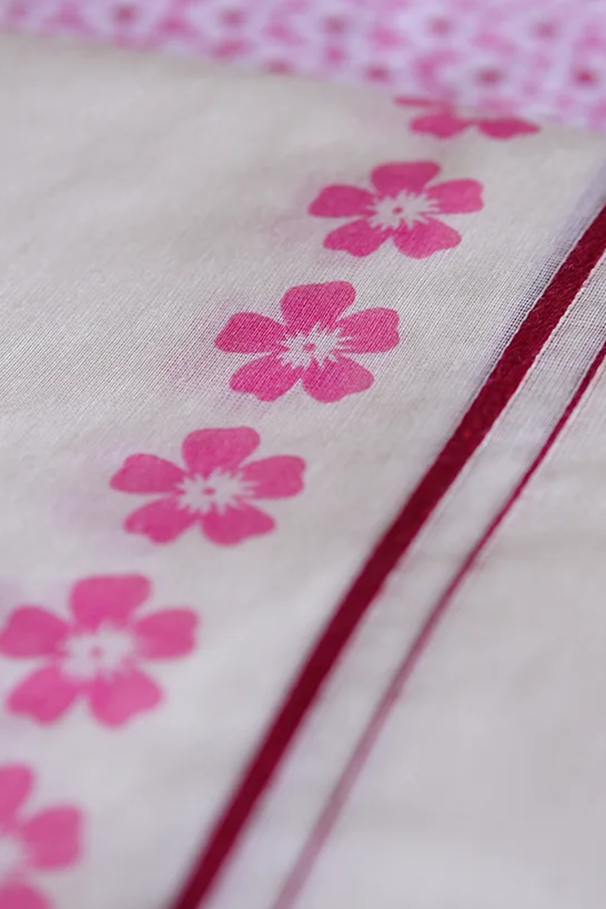 Arunima - Pink Floral Printed Puliyilakkara Settumund with Matching Floral Blouse Material