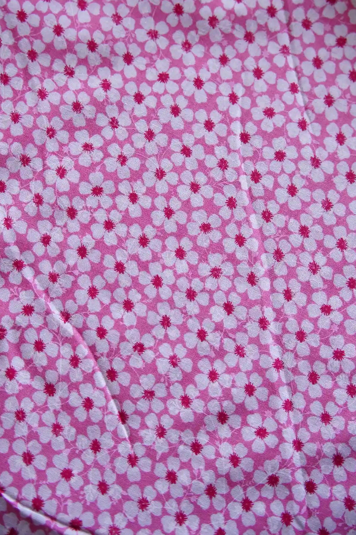 Arunima - Pink Floral Printed Puliyilakkara Settumund with Matching Floral Blouse Material