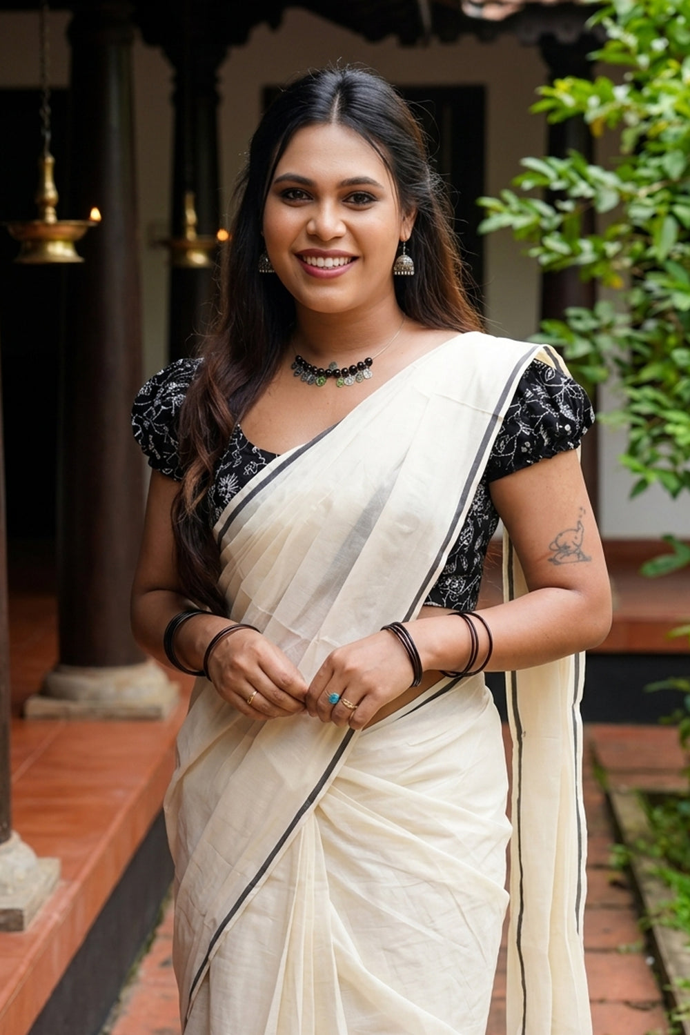 Rathri - Black Puliyilakkara Saree with Printed Blouse Material