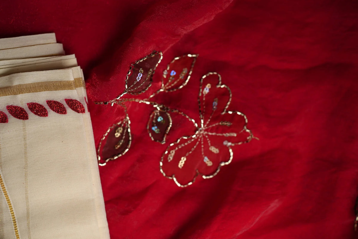 Red embroidered blouse material detail