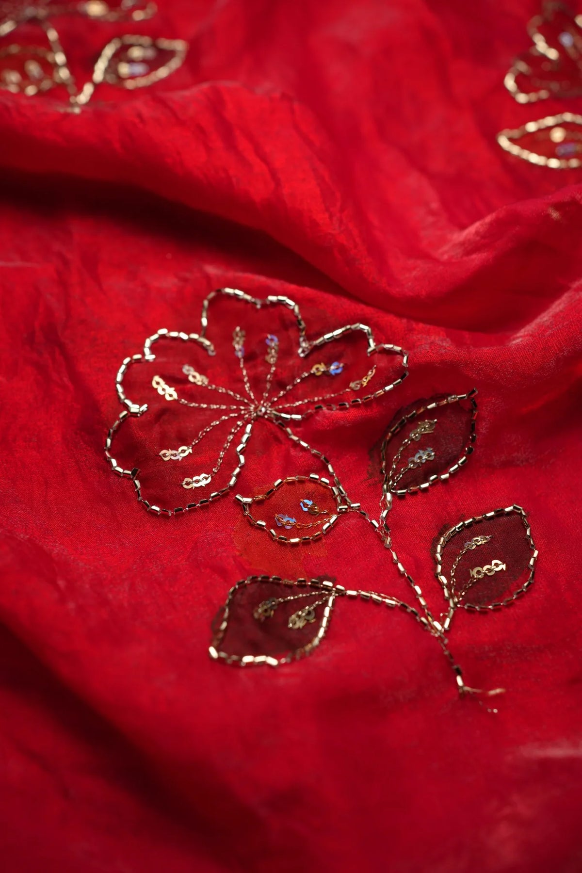 Red blouse embroidery close-up