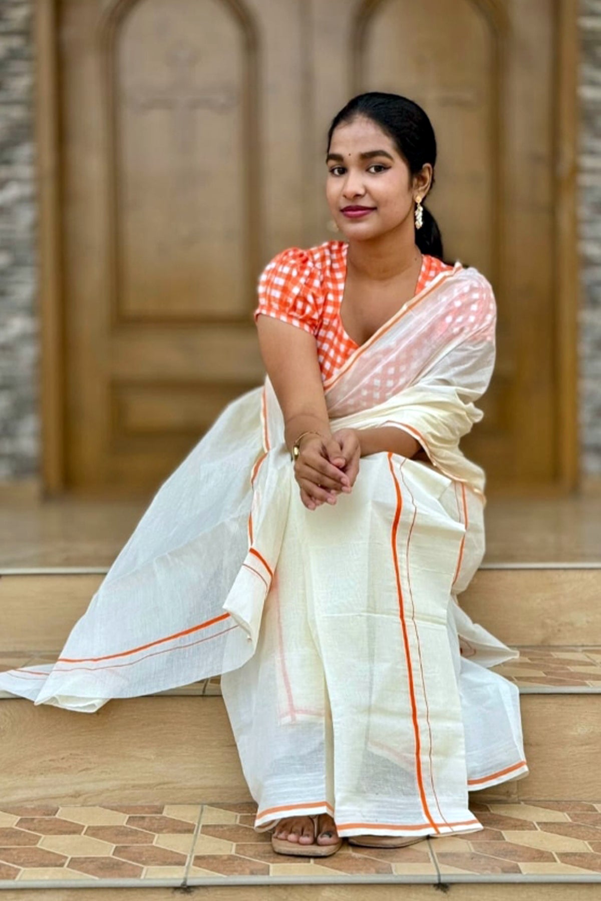Tapasya -Orange Puliyilakkara Settu Mundu with Checked Blouse Material
