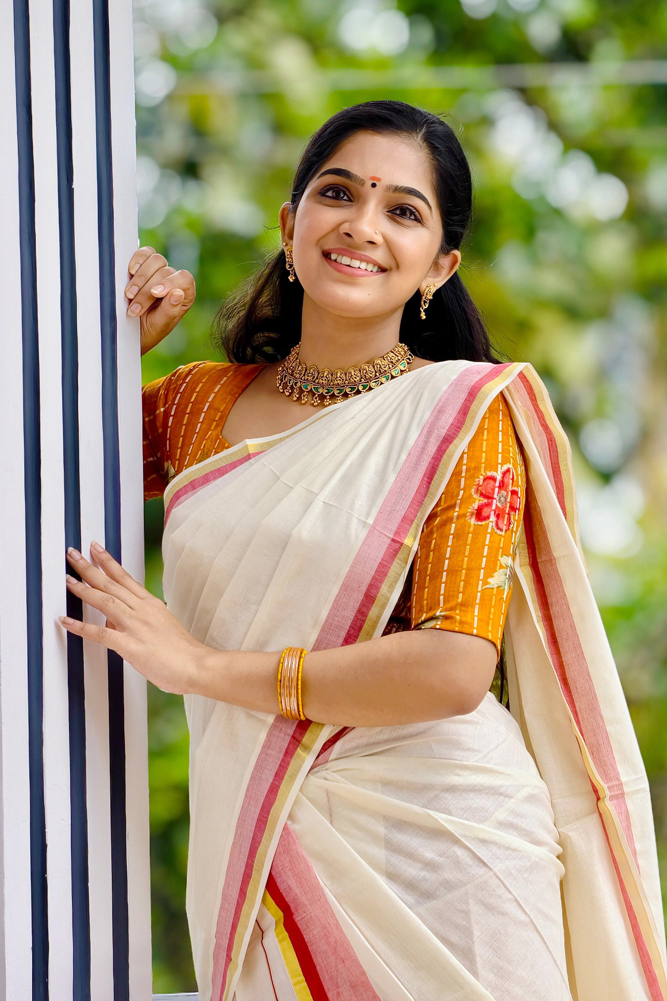 Chendumalli – Yellowish Orange and Golden Kasavu Settumund with Designer Blouse Material