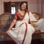 Sahrudaya– Mirror worked Lace border Stitched Settumund with Matching Blouse Material