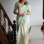 Radhika – Premium Kasav Settumund with Matching Striped Weave Blouse Material