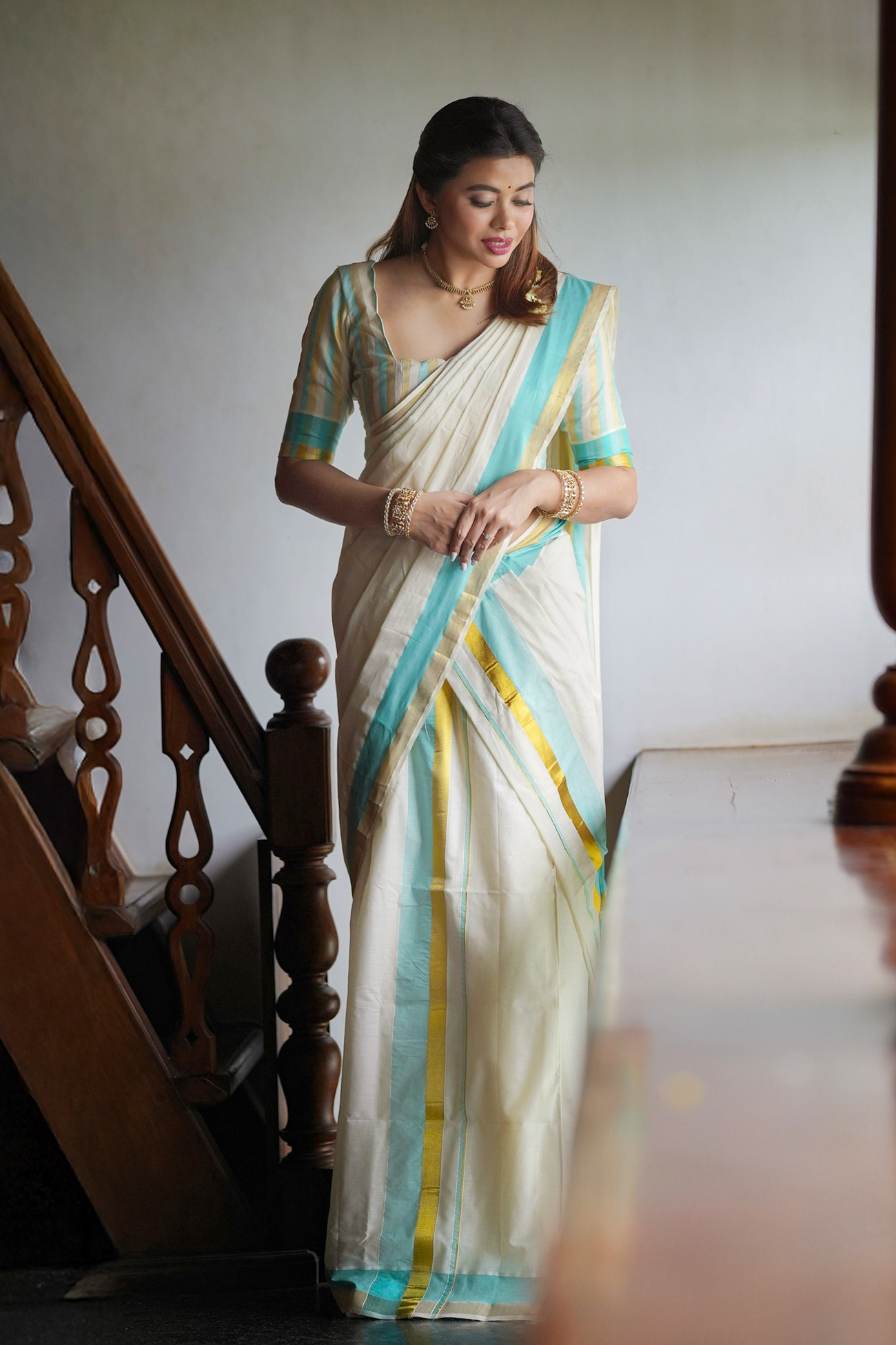 Radhika – Premium Kasav Settumund with Matching Striped Weave Blouse Material