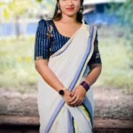 Neelima – Dark Blue and Golden Kasav Settumund with Designer Blouse Material
