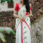 Thatha Green Parrot Printed on Red Kattikkara Settumund with Plain Red Blouse Material