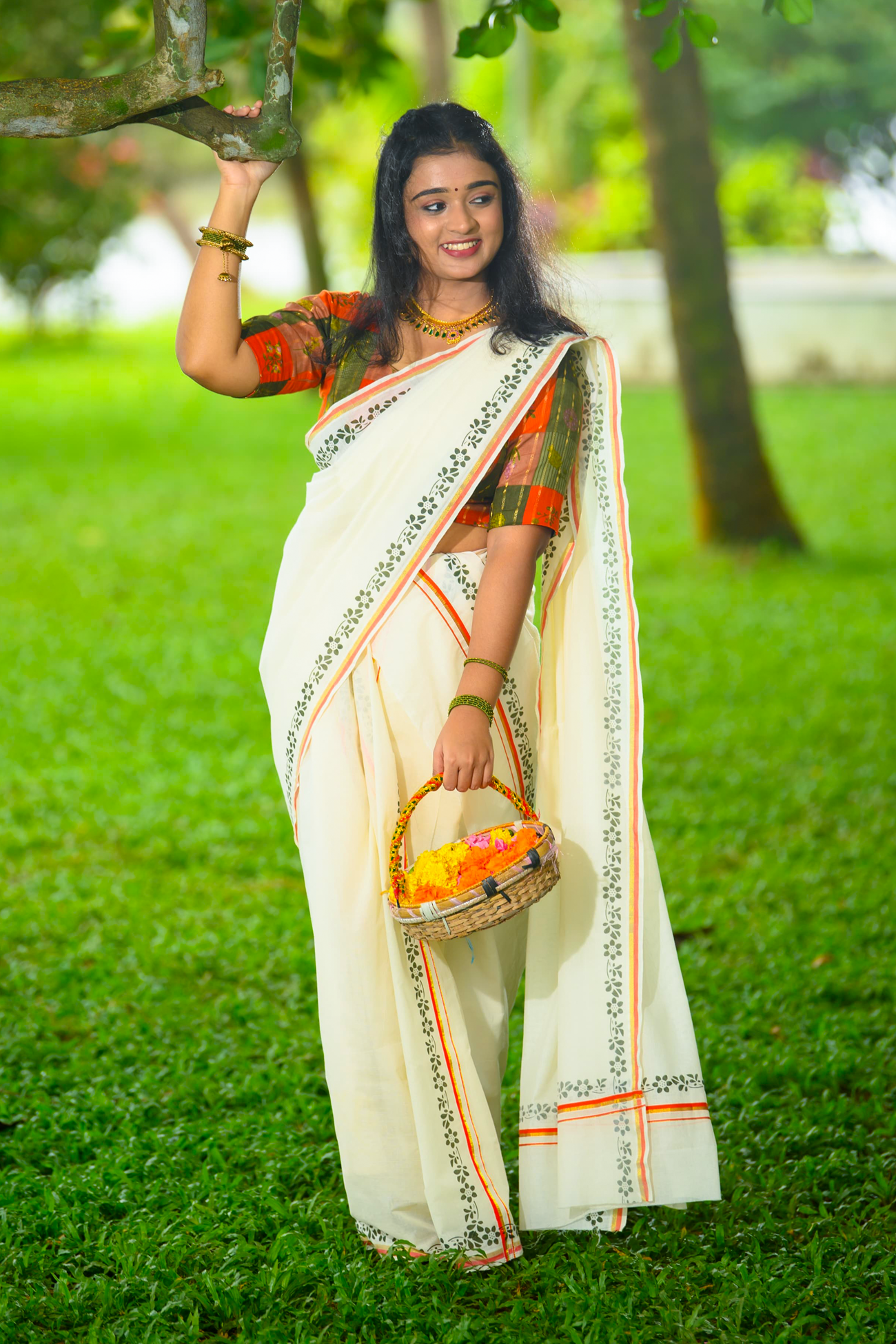 Chandrika – Orange and Golden Kasav Settumund with Printed Border and Designer Blouse Material