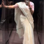 Nyla - Green Puliyilakkara saree with Floral Printed Blouse Material