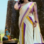 Aathira – Violet and Golden Kasav Settumund with Brocade Blouse Material
