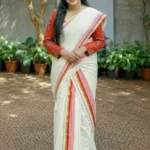Chemboov – Red and Golden Kasav Settumund with Designer Blouse Material
