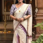 Laila – Lavender and Golden Kasav Settumund with Lavender Floral Shimmering Blouse Material
