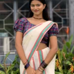 Sakhi - Mulloth Settumund with Checked Blouse Material