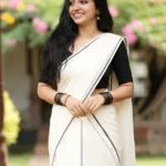 Shyamili -Black puliyilakkara settmund with  blouse material