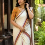 Ohm-premium traditional settmundu with blouse material