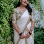 Vamika- Traditional settmundu with printed blouse material