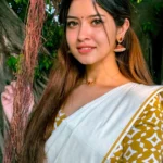 Nihara-Yellow Puliyikkara with matching blouse  material