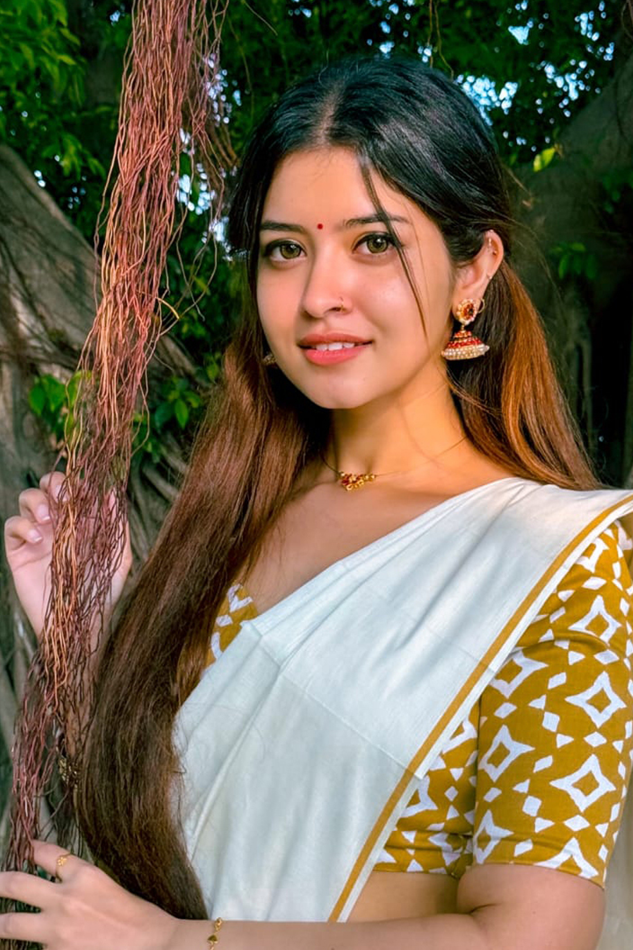 Nihara-Yellow Puliyikkara with matching blouse  material