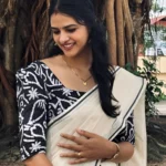 Kaantha black- Premium settmundu with printed Blouse Material