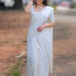 Kavya - Premium Golden Puliyilakkara Settumund with Golden Foil Printed Border with Blouse