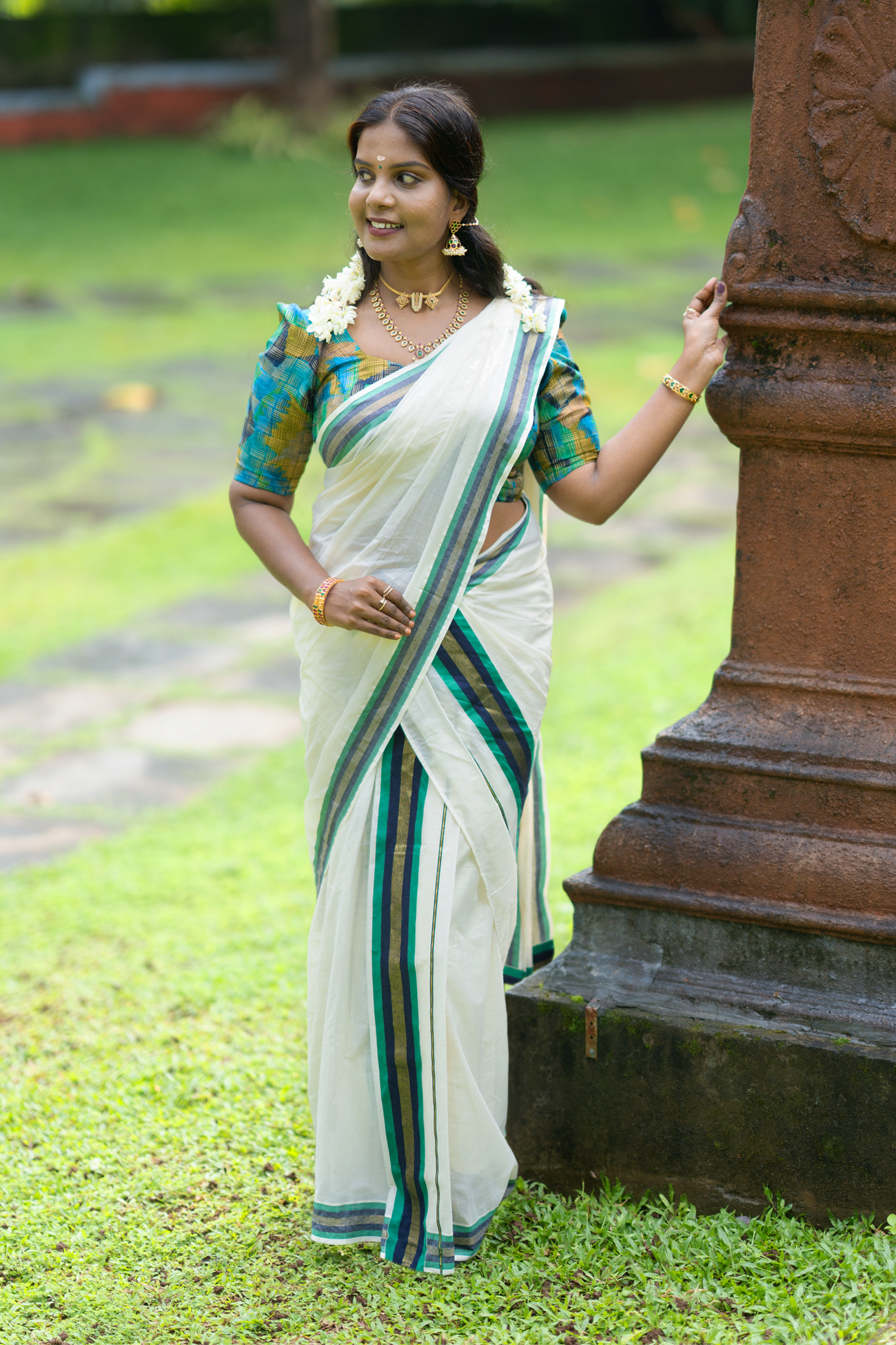 Hiranmayi Settumundu with Green & Light Golden Border and Matching Blouse Material