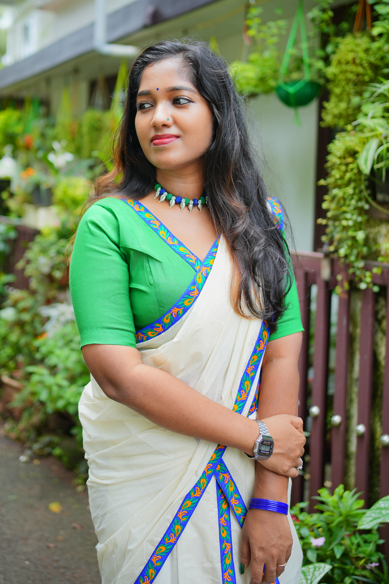 Mayoora Green Settumundu with Stitched Multicolor Border and Plain Blouse Material