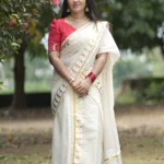 Onathumbi Settumundu with Golden Butterfly Foil Border and Red Blouse Material