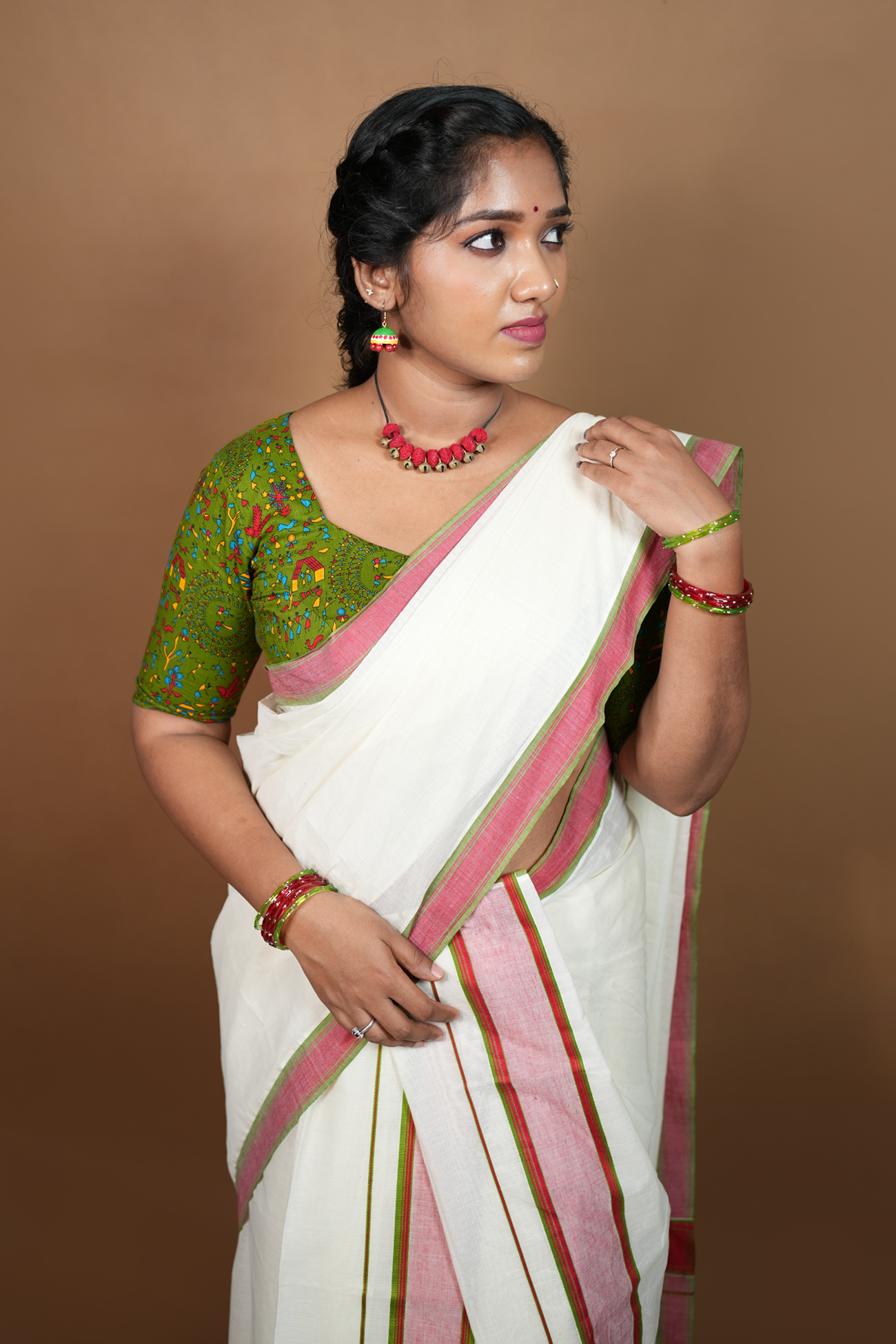 Warly Settumundu with Green Border and Matching Blouse Material