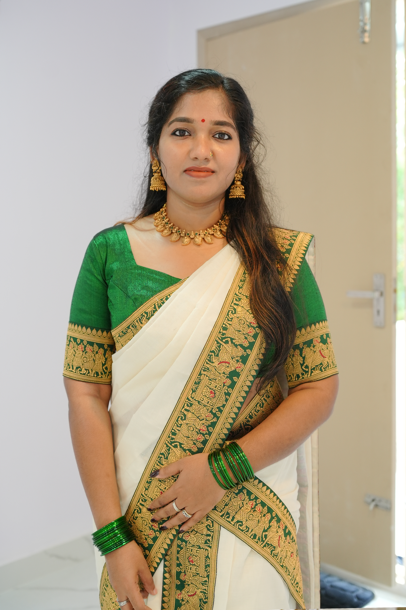 Swayamvara Settumundu with Green & Gold Border and Matching Blouse Material