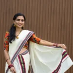 Hiranmayi Settumundu with Multicolour Striped Border & Printed Blouse Material